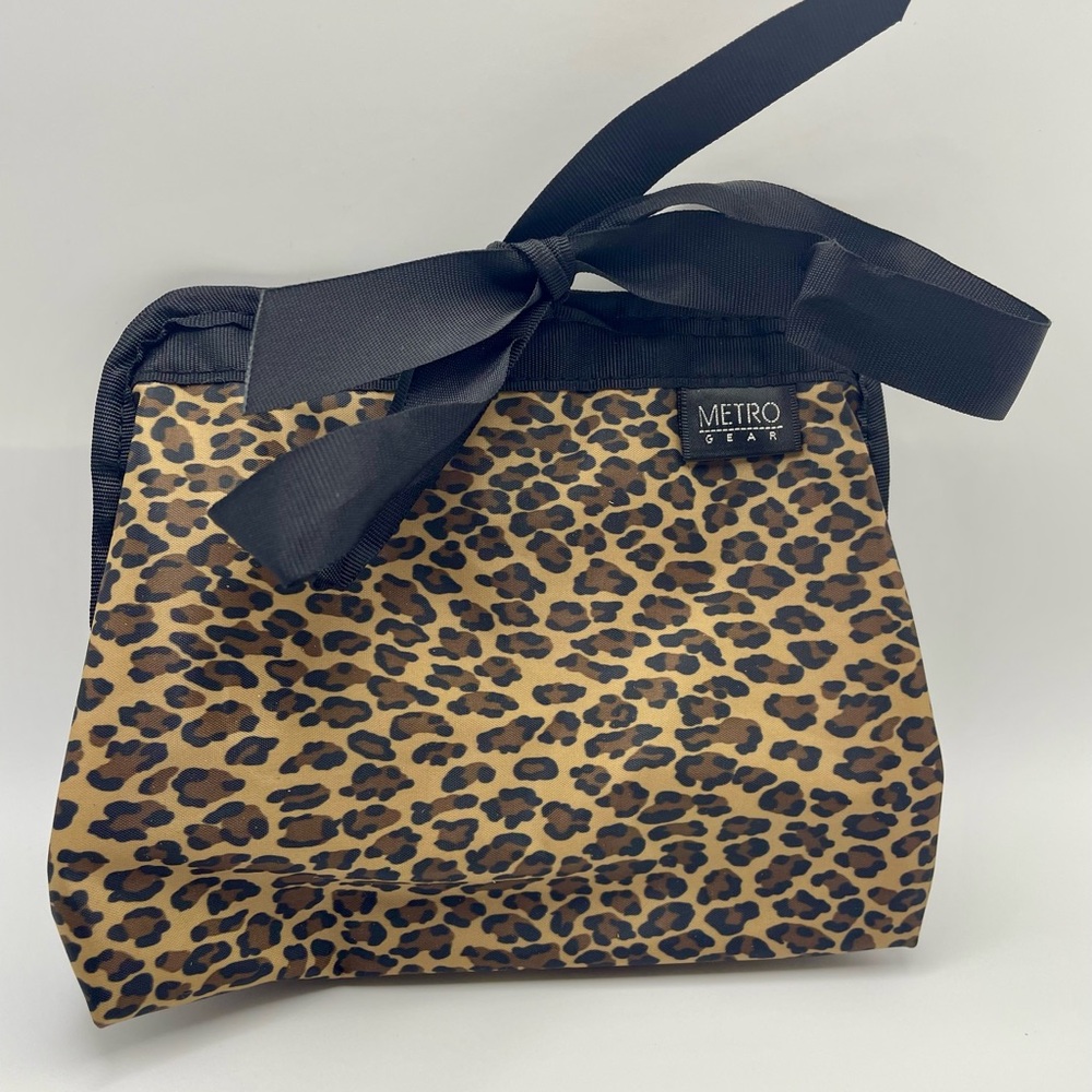 Metro Gear Leopard Print Cosmetic Bag with Black Bow. Roll up Travel Organizer